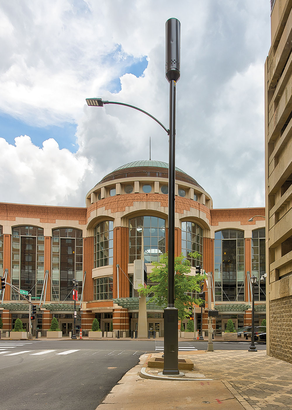 5G Installation Option: A partially concealed small cell topper on a light pole in St. Louis. Photo by Raycap.