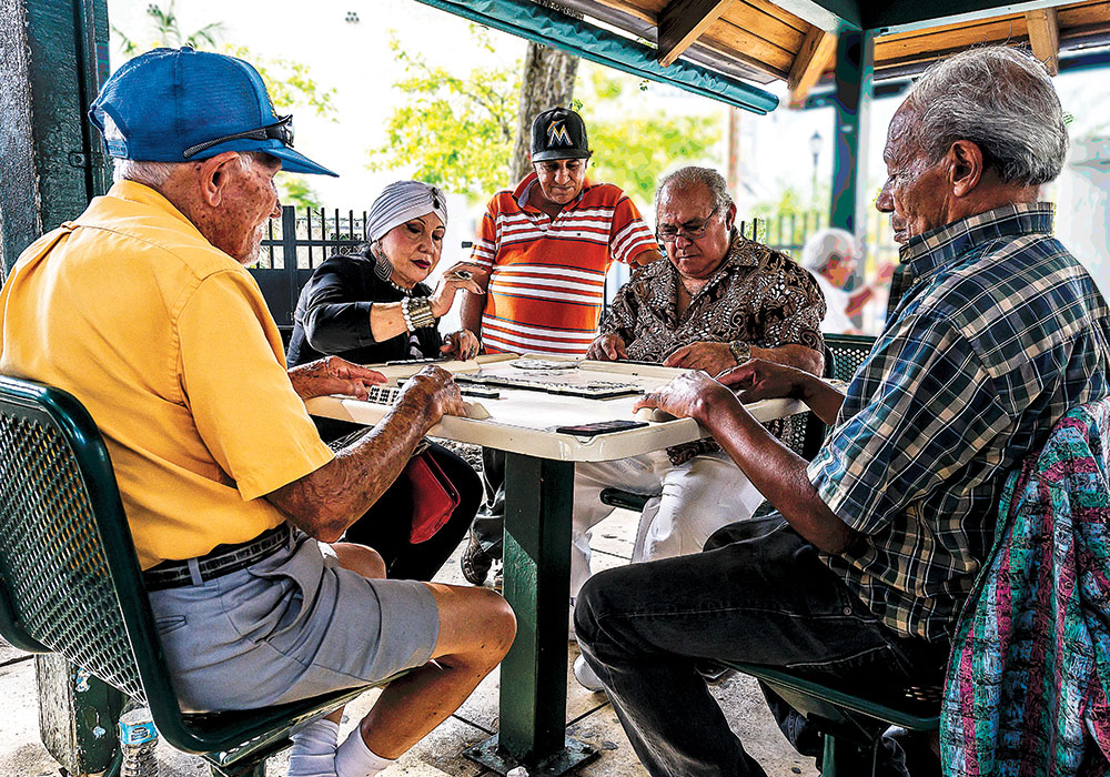 Planners should try to understand the complex identities of the Hispanic and Latin/o/a/x communities they serve. Navigating ethnonyms plays a huge role. Below, residents play dominoes in Miami’s Little Havana neighborhood. Photo by Llevin1/iStock Editorial/Getty Images Plus.