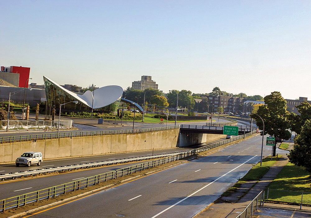 The six-lane I-270 highway that had for decades divided the eastern part of Rochester, New York, was removed and replaced in 2018 with new complete streets. Wikimedia photo by AIP3745.