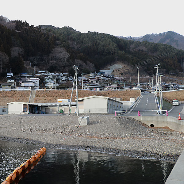 The town of Koube initially asked for a levee but chose to rebuild a workplace at sea level and move homes higher, above a repositioned road. Photo courtesy of Kanako Iuchi.