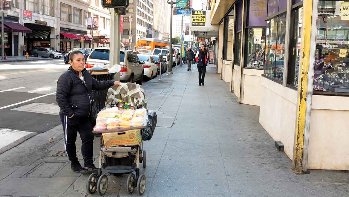 Local policies often create significant financial and legal barriers for street vendors through pricey permits and penalties like fines, misdemeanor charges, and even jail time. Photo by Rudy Espinoza.