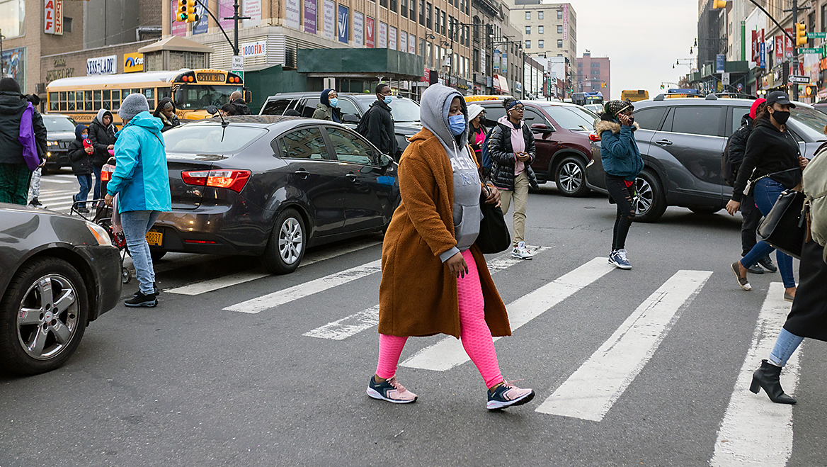 To keep pedestrians safe, one city in Washington State is using traffic cameras in congested intersections to ticket cars that “block the box” and pedestrians who walk against traffic signals. Photo by Yuvraj Khanna/The New York Times.