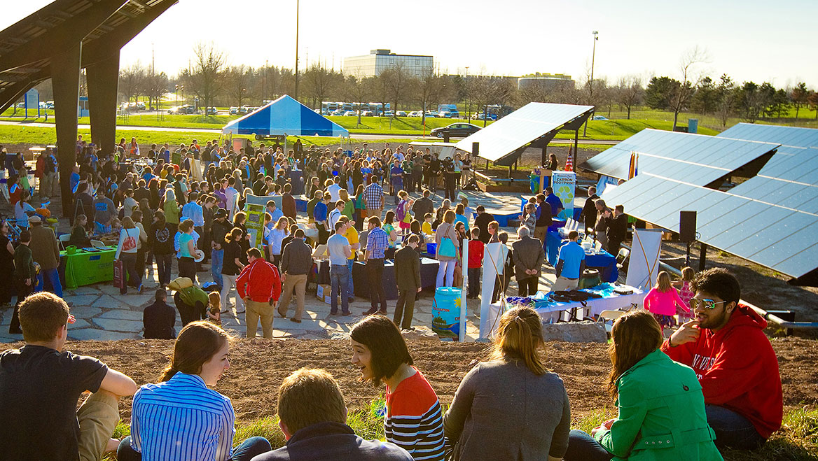 Students, faculty, and the community mingle in outdoor classrooms amid the artful, publicly accessible power plant of the Solar Strand, set within restored wetlands and grasslands at the University at Buffalo in New York.