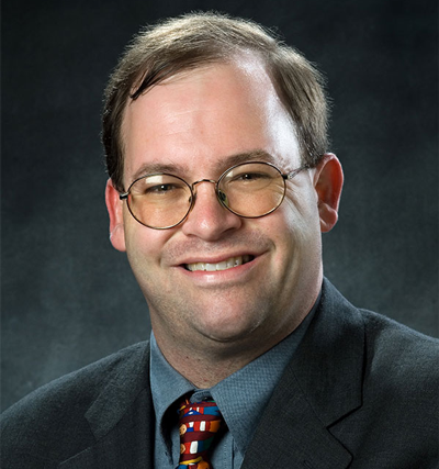 Headshot of Chris Kochtitzky.