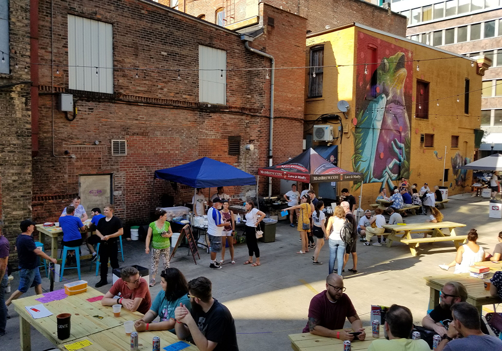 When the space is activated, the alleyway doubles the usable space and becomes a part of the experience. Photo Credit: Fort Wayne Community Development