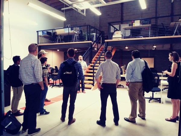 Group of mentorship participants on a site tour